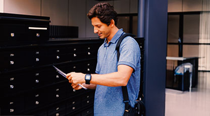 Image of a man looking at tax forms