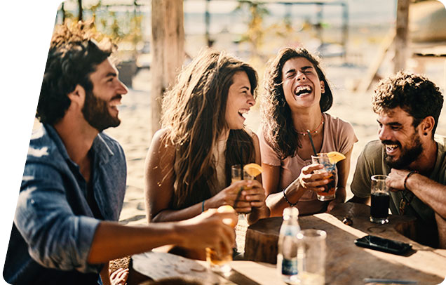 People laughing and having drinks