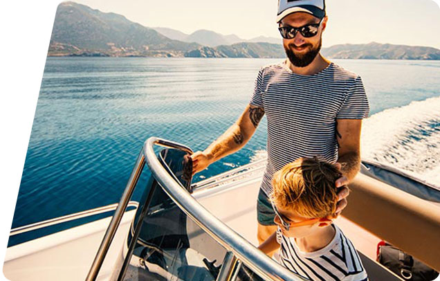 two people driving a boat