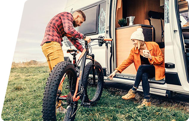 a person looking out the side of an RV