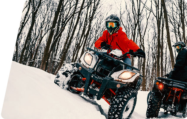 a person riding a snowmobile