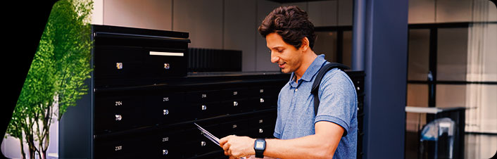 Image of a man looking at tax forms